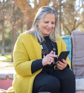 Woman Looking at Old Photos