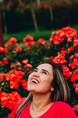 Woman smiling in a garden