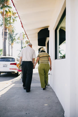 An older couple walking