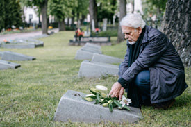 Husband Grieving Wife