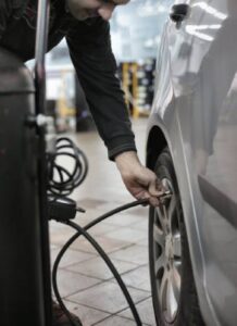 Man Filling Tire