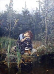 Woman Sitting on Rocks