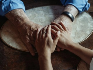 Hands of Two People