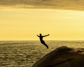 Man Diving In Ocean